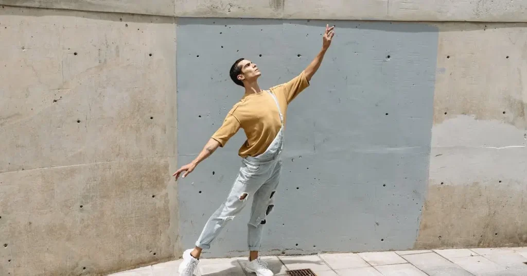 a man in front of a concrete wall as a Dancer Drawing Reference