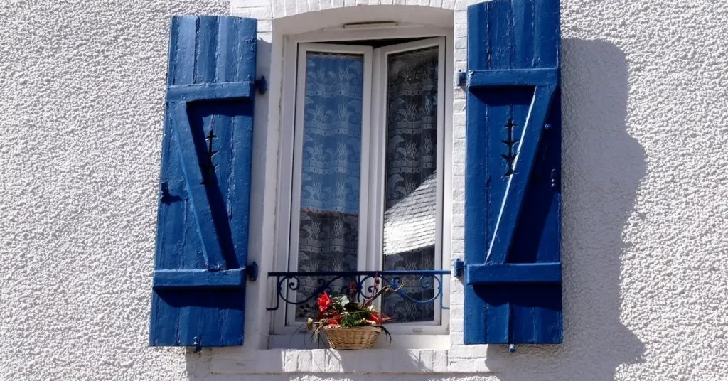 a windows with blue shutters as blue things to draw