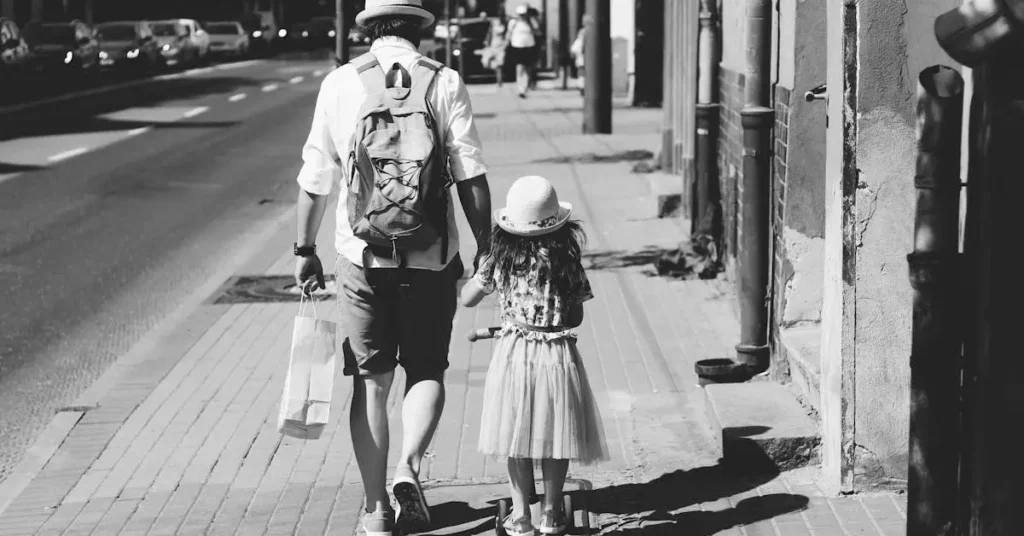 father walking with his daughter as Father's Day Drawing Ideas