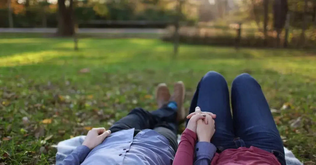 holding hands in a park as couple drawing ideas